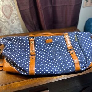 Stylish Navy Polka Dot Travel Bag with Tan Details​